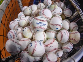 Baseballs for batting practice are seen during 2017 Opening Day April 11, 2017 in Miami, Florida.