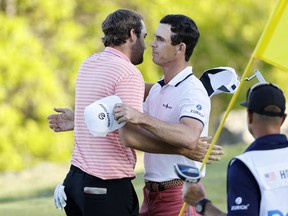 Billy Horschel (right) shakes hands with fellow American Scottie Scheffler after winning 2&1 in the final round of the World Golf Championships-Dell Technologies Match Play at Austin Country Club on Sunday.