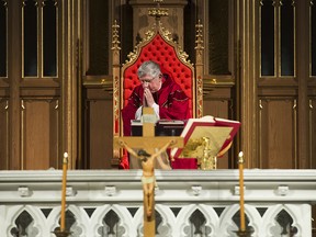 Cardinal Thomas Collins delivers an online Good Friday service in an empty St. Michael’s Cathedral in Toronto on Friday, April 10, 2020.
