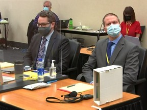 Former Minneapolis police officer Derek Chauvin listens as opening arguments commence in his trial for second-degree murder, third-degree murder and second-degree manslaughter in the death of George Floyd in Minneapolis, Minn., March 29, 2021 in a still image from video.