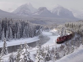 A Canadian Pacific freight train travels around Morant's Curve near Baker Creek, Alta. on Monday, Dec. 1, 2014.