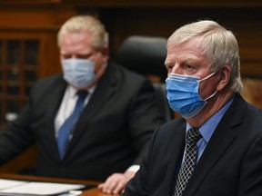 Retired Gen. Rick Hillier, right, chair of the COVID-19 Vaccine Distribution Task Force and Ontario Premier Doug Ford give an update in Toronto on Tuesday, January 5, 2021.