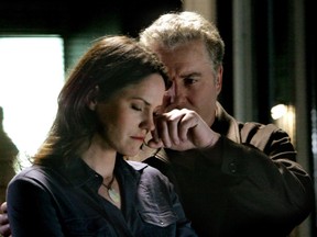 William Petersen and Jorja Fox in a scene from the original CSI: Crime Scene Investigation.
