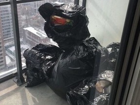 Landlord Farzad Lahouti says a deadbeat tenant has left him $35,000 in the hole and that his luxury condo been damaged. His supplied picture shows garbage bags on the balcony.