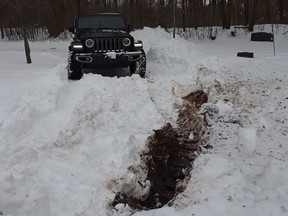An image released by OPP of a Jeep in a Caledon cemetery on Feb. 22, 2021.