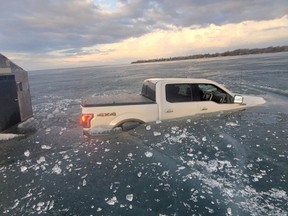 An image released by York Regional Police of a pickup truck going through the ice on Lake Simcoe on March 12, 2021.
