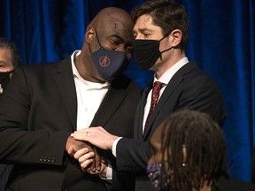 Rodney Floyd (left), brother of George Floyd, speaks with Mayor Jacob Frey during a press conference at the Minneapolis Convention Center on March 12, 2021 in Minneapolis, Minnesota.