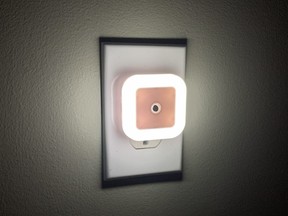 LED nightlight close up in dark room.