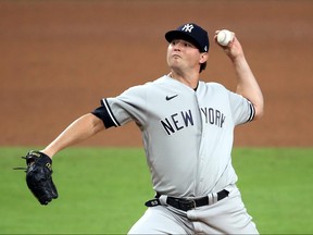 Zack Britton of the New York Yankees delivers the pitch against the Tampa Bay Rays during the sixth inning in Game Five of the American League Division Series at PETCO Park on Oct. 9, 2020 in San Diego, Calif.