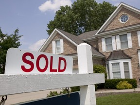 House sold sign