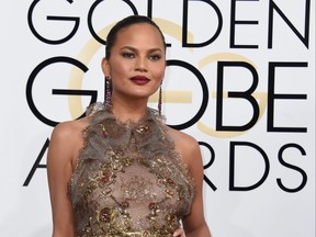 Chrissy Teigen arrives at the 74th annual Golden Globe Awards, Jan. 8, 2017, at the Beverly Hilton Hotel in Beverly Hills, Calif.