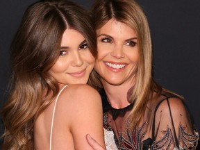 Olivia Jade, left, and Lori Loughlin attend the Women's Cancer Research Fund's 'Unforgettable Evening' in Los Angeles, Calif., on Feb. 27, 2018.