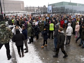 People protest against Finnish government's regulations to fight the coronavirus pandemic, in Helsinki, Finland March 20, 2021.