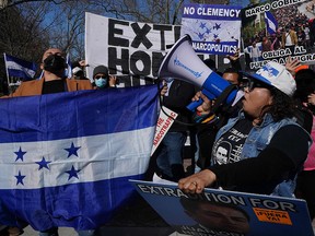 Protestors celebrate outside the U.S. District Court Southern District of New York on March 30, 2021.