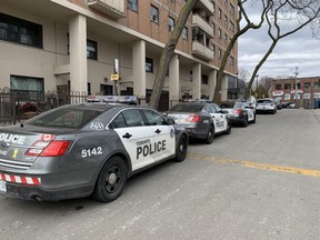 Toronto Police at the scene at 295 Shuter St. after the discovery of two bodies on Tuesday, March 16, 2021.