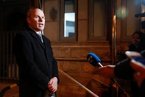 Jim Nickel, charge d’affaires of the Canadian Embassy in Beijing, talks to the media outside Beijing No. 2 Intermediate People’s Court after a trial of Michael Kovrig, a Canadian detained by China in December 2018 on suspicion of espionage, in Beijing, China March 22, 2021.