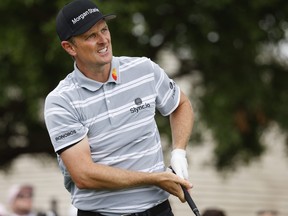 Justin Rose hits his drive down the first fairway during the third round of the Arnold Palmer Invitational golf tournament at Bay Hill Club & Lodge in Orlando, Fla., March 6, 2021.