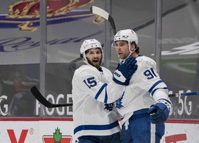 Alex Kerfoot, left, could line up with centre John Tavares during games when a more defensive presence is required on the Leafs’ second line. USA TODAY SPORTS
