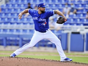 Toronto Blue Jays reliever Kirby Yates pitches against the Detroit Tigers during a spring training game Thursday, March 11, 2021, at TD Ballpark in Dunedin, Fla.