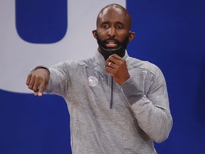 Atlanta Hawks head coach Lloyd Pierce calls to his team during a game  at Madison Square Garden.