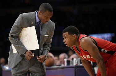 FILE - In this Jan. 1, 2017, file photo, Toronto Raptors coach Dwane Casey talks with guard Kyle Lowry during the team's NBA basketball game against the Los Angeles Lakers in Los Angeles. Lowry (22.4 points, 7.0 assists) and DeMar DeRozan (27.3 points) form one of the toughest backcourts in the NBA. (AP Photo/Kelvin Kuo, File) ORG XMIT: NY171 ORG XMIT: POS1704141722581052