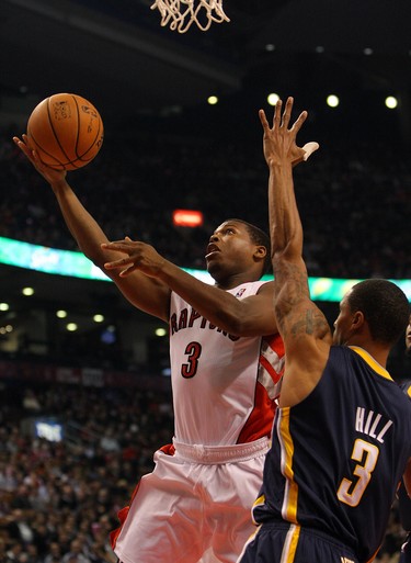 TORONTO, CANADA - OCTOBER 31:  Kyle Lowry #3 of the Toronto Raptors drives to the net against George Hill #3 of the Indiana Pacers on October 31, 2012 at the Air Canada Centre in Toronto, Canada. NOTE TO USER:  User expressly acknowledges and agrees that, by downloading and or using this photograph, User is consenting to the terms and conditions of the Getty Images License Agreement. (Photo by David Sandford/Getty Images)