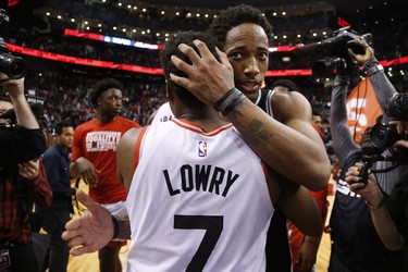 San Antonio Spurs DeMar DeRozan SG (10) hugs his former teammate Toronto Raptors Kyle Lowry PG (7) after the game  in Toronto, Ont. on Saturday February 23, 2019. Jack Boland/Toronto Sun/Postmedia Network