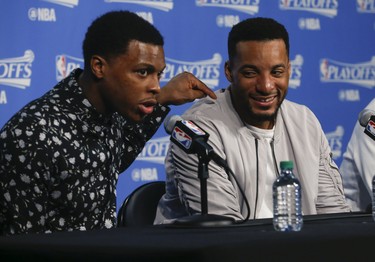 Toronto Raptors Kyle Lowry (L) Norman Powell and DeMar DeRozan (R) talk during after game interviews in Toronto, Ont. on Monday April 24, 2017. Jack Boland/Toronto Sun/Postmedia Network