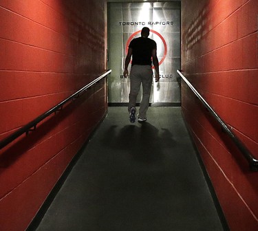 Kyle Lowry walks to the locker room on locker clean out day in 2014.
