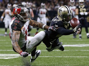 Marshon Lattimore (right) of the New Orleans Saints breaks up a pass intended for Mike Evans of the Tampa Bay Buccaneers at Mercedes-Benz Superdome on November 5, 2017 in New Orleans.