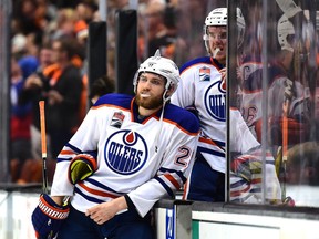 Edmonton Oilers stars Leon Draisaitl (left) and Connor McDavid combined for five points in an overtime loss to the Maple Leafs on Saturday night.