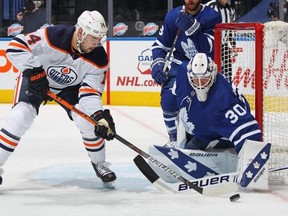 Edmonton’s Devon Shore is stopped by Leafs goalie Michael Hutchinson last night.  Getty Images