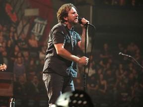 Eddie Vedder, lead singer of Pearl Jam, performs at the Scotiabank Saddledome in Calgary, Alta. on December 2, 2013.