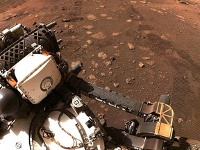 This NASA image released on March 5, 2021, was captured while NASA's Perseverance rover drove on Mars for the first time on March 4, 2021.