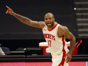 Houston Rockets forward P.J. Tucker points as he makes a three point basket against the Toronto Raptors during the first half at Amalie Arena in Tampa, Fla, Feb. 26, 2021.