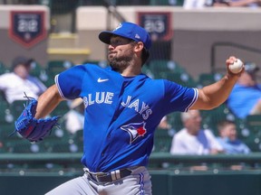 Toronto Blue Jays starting pitcher Robbie Ray throws during a spring training game on March 19, 2021.