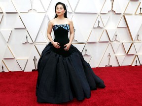 Kelly Marie Tran poses on the red carpet during the arrivals at the 92nd Academy Awards in Hollywood, February 9, 2020.