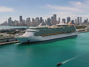 An aerial view from a drone shows Royal Caribbean’s Navigator of the Sea docked at PortMiami on March 2, 2021 in Miami.