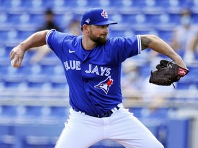 Toronto Blue Jays pitcher Kirby Yates faces the Detroit Tigers in a spring training game on March 11, 2021.