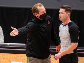 Toronto Raptors head coach Nick Nurse argues with officials about a foul call during a game between the Toronto Raptors and the Minnesota Timberwolves at Amalie Arena on Feb. 14, 2021.