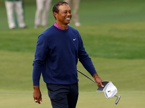 Tiger Woods of the U.S. reacts after completing the second round of The Masters at Augusta National Golf Club in Augusta, Ga., Nov. 14, 2020.