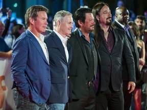 The Tragically Hip - minus Gord Downie - on the red carpet for Long Time Running during the Toronto International Film Festival in Toronto on Wednesday Sept. 13, 2017. From left are Gord Sinclair, Johnny Fay, Paul Langlois and Rob Baker.