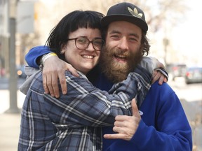 Althea Smith, 26, and her friend Aaron Gerrett, 32, are pictured on March 19, 2021, days after escaping a fire in the Beach.