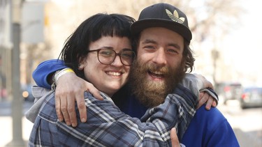 Althea Smith, 26, and her friend Aaron Gerrett, 32, are pictured on March 19, 2021, days after escaping a fire in the Beach.