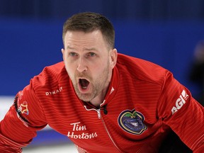 Newfoundland and Labrador skip Brad Gushue yells instructions to his sweepers against Alberta during the final of the 2020 Tim Hortons Brier in Kingston on March 8, 2020.