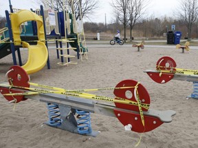 A children's playground at Woodbine Beach Park were taped off by the City of Toronto due to COVID-19 restrictions, March 26, 2020.