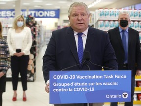 Ontario Premier Doug Ford and his COVID-19 Vaccine Task Force members at a Shoppers Drug Mart at Sherway Gardens in Etobicoke on Friday, March 19, 2021.