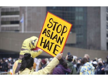 Thousands packed Nathan Phillips Square at Toronto's city hall to stand in solidarity against Anti-Asian racism this following recent racially-motivated hate events like the shootings in Atlanta and "scapegoating" people of Chinese descent for the COVID-19 pandemic Sunday March 28, 2021. Jack Boland/Toronto Sun/Postmedia Network