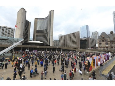Thousands packed Nathan Phillips Square at Toronto's city hall to stand in solidarity against Anti-Asian racism this following recent racially-motivated hate events like the shootings in Atlanta and "scapegoating" people of Chinese descent for the COVID-19 pandemic Sunday March 28, 2021. Jack Boland/Toronto Sun/Postmedia Network