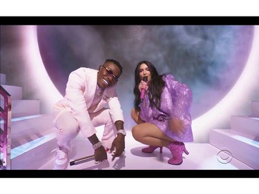 Dua Lipa and DaBaby perform in this screen grab taken from video of the 63rd Annual Grammy Awards in Los Angeles, California, U.S., March 14, 2021.